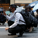 Office workers in the Central business district took part in a lunchtime protest where police fired multiple grounds of tear gas on Nov. 11, 2019.